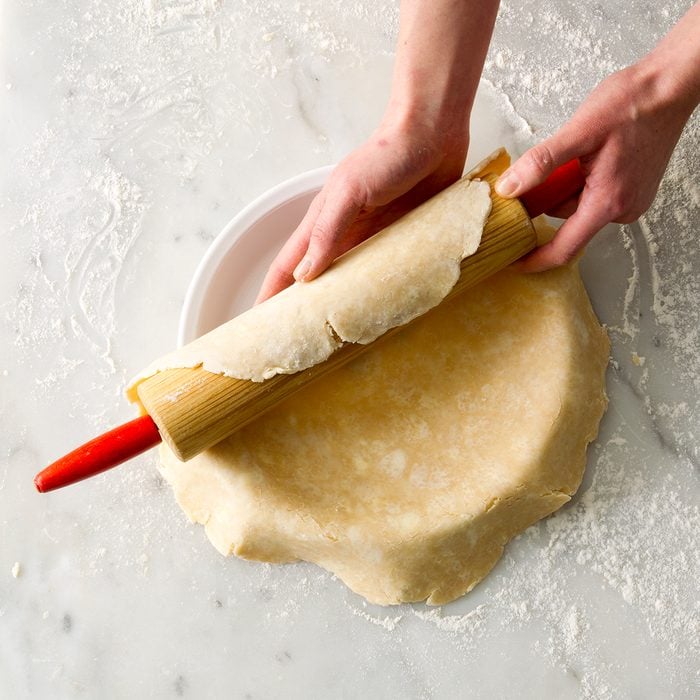 transfering pie crust from rolling pin to pie dish